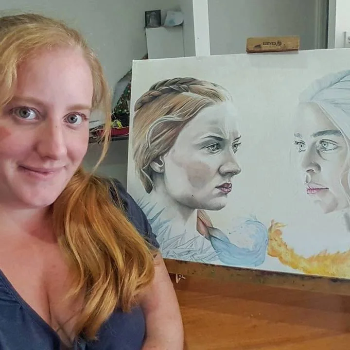 Portrait beside a large work-in-progress fantasy artwork